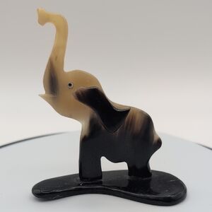 Elegant Miniature Black and Cream Elephant Figurine